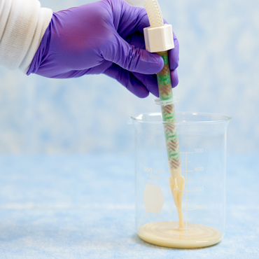 Pipette extracting from beaker